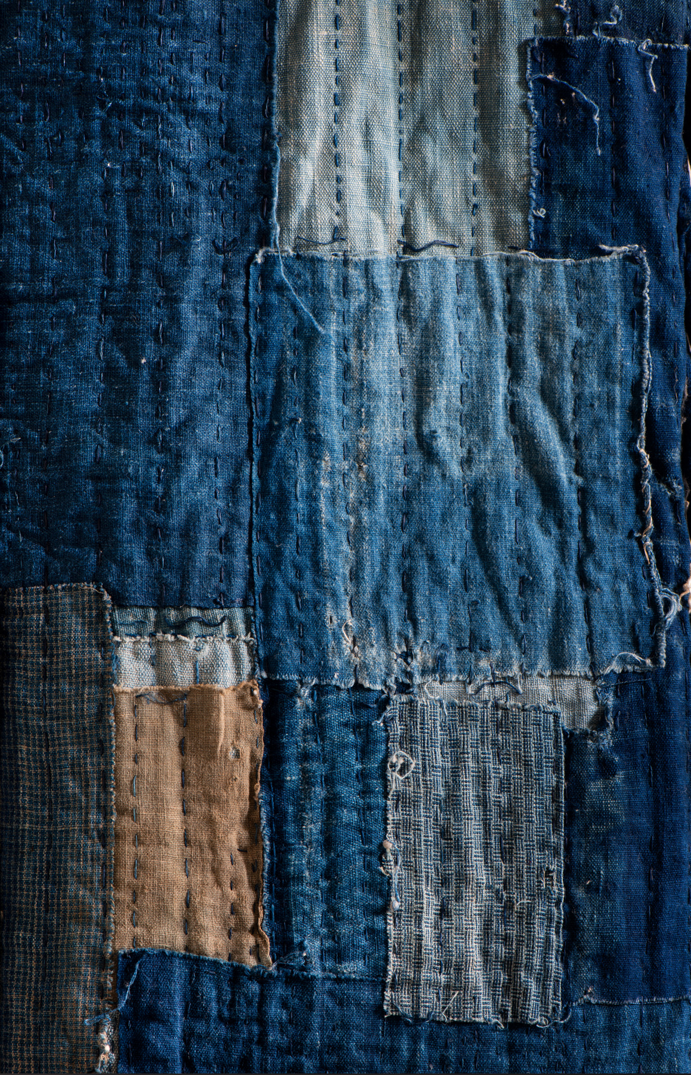 Indigo boro cloth patched and mended with sashiko running stitch